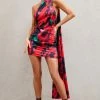 Nasira | Black Floral Asymmetric Neck Open Back Mini Dress With Scarf Detail -Dress Shop WB CL127656 NasiraBlackFloralAsymmetricNeckOpenBackMiniDressWithScarfDetail0 2